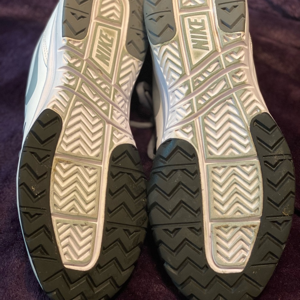 Nike white and gray tennis shoes.